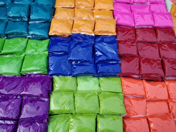 istock Colorful Holi powders on market stall 925800488