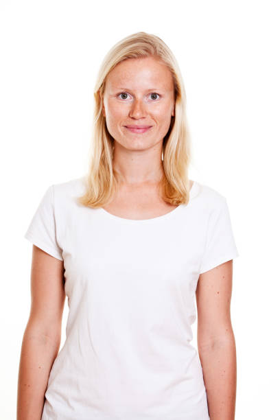 istock blond young woman with freckles 925804360