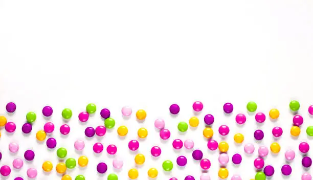 Photo of Birthday party background with multicolored candy