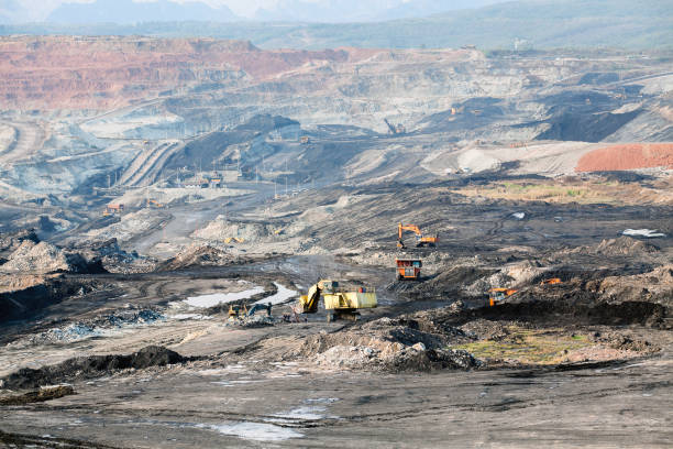 istock Part of a pit with big mining truck working 925826328