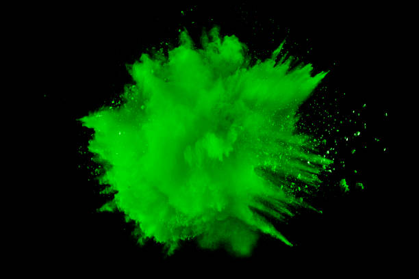 istock abstract green dust explosion on  black background.abstract green powder splattered on black background.Freeze motion of green powder exploding. 925827992