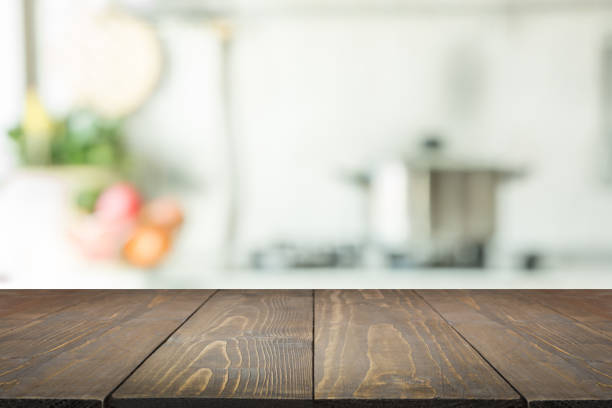 istock Blurred background. Modern kitchen with tabletop and space for you. 925830398