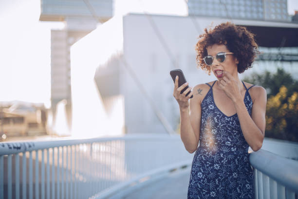 istock Curly woman taking a selfie 925831126