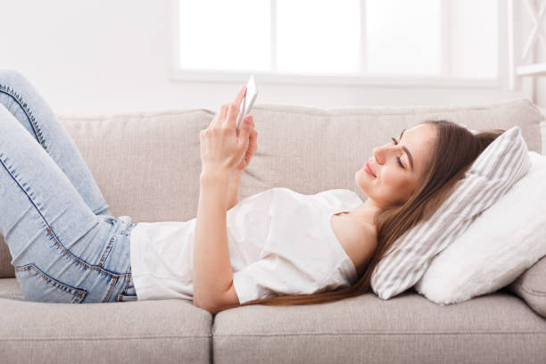 istock Young girl texting on smartphone 925835698