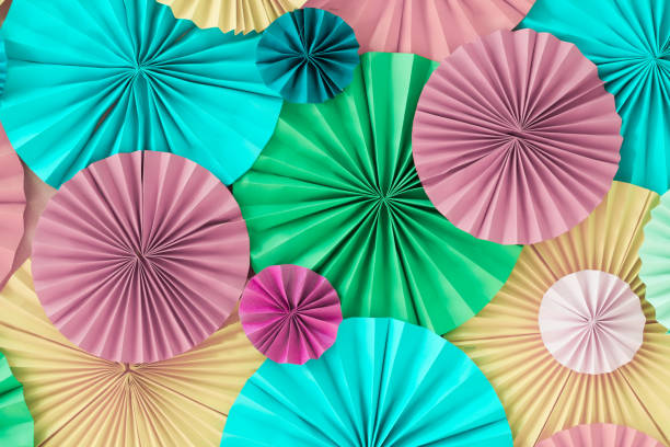 istock Colorful celebration pastel background wall with versicoloured paper circles 925838224