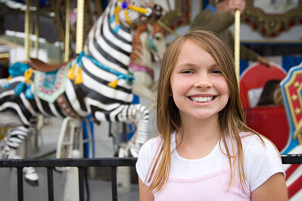 istock Girl at merry-go-round 92584251
