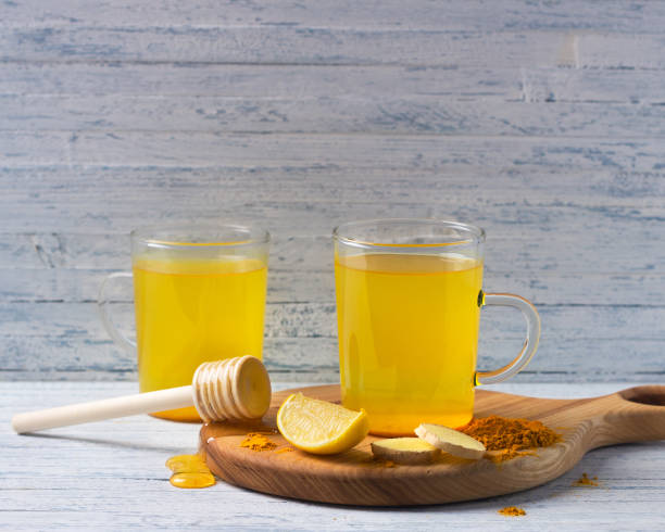 istock Energy tonic drink with turmeric, ginger, lemon and honey 925850628