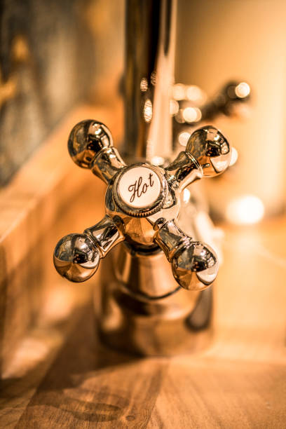 An antique style hot water faucet fixture.
