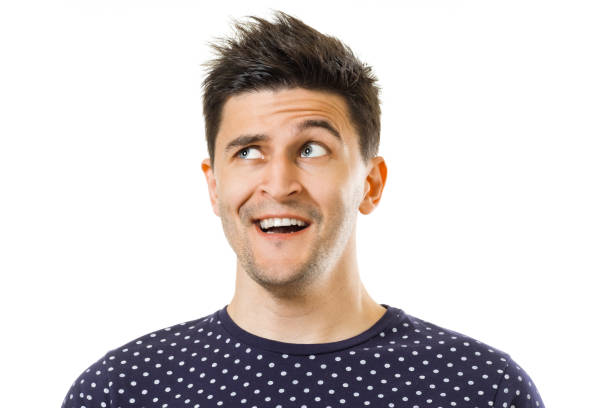 istock Facial expression of cheerful young guy 925856768