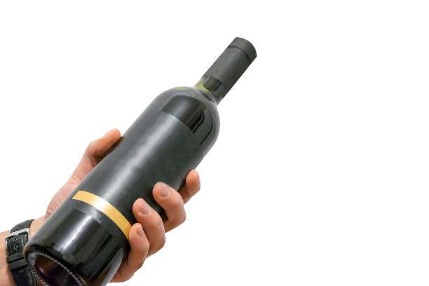 Man hand holding bottle of wine with template label isolated on white background
