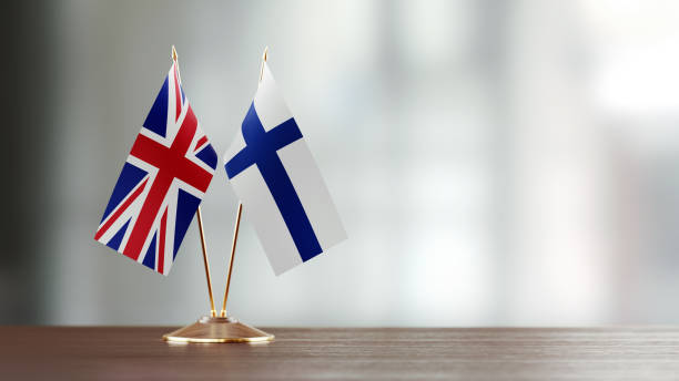 istock British And Finnish Flag Pair On A Desk Over Defocused Background 925863700