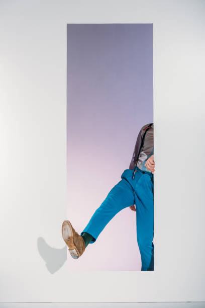 istock cropped image of man in stylish clothes going through frame on white 925865636