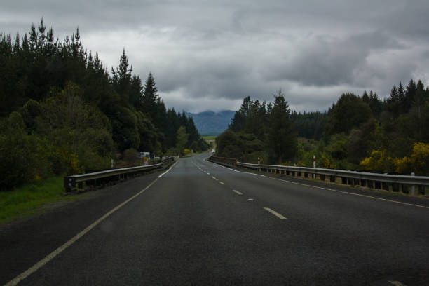 istock New Zealand Asphalt Road on cloudy day 925870992