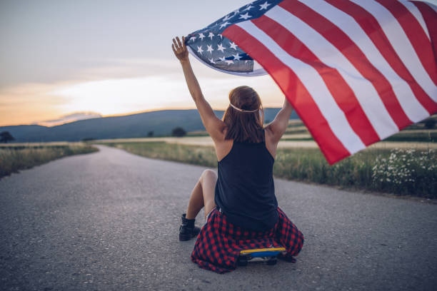 istock Young woman with an American flag 925877194
