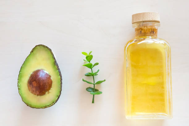 istock Fresh Avocado and oil in bottle 925877294