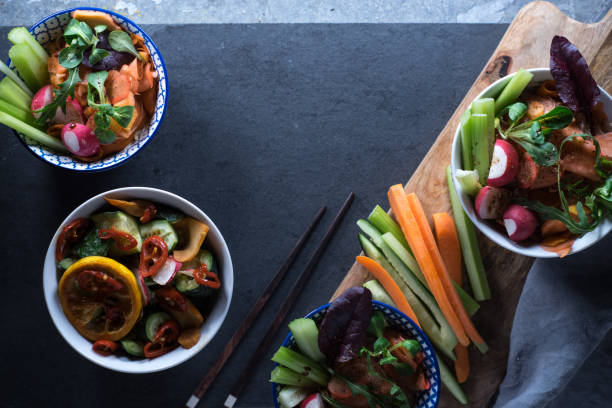 istock Marinated vegetables in bowls and chopsticks copy space. Asian cuisine 925879206