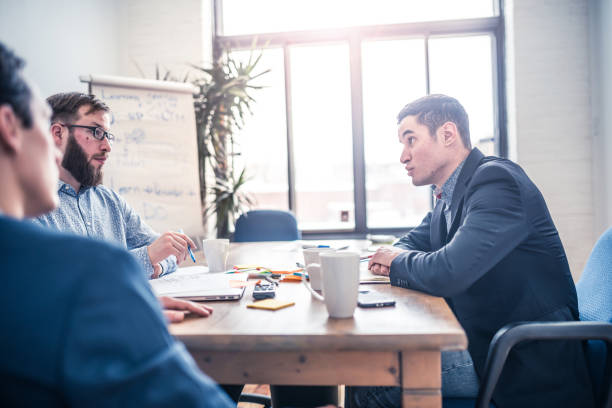 istock Young partners discussing business ideas 925890726