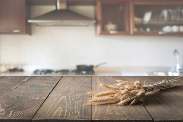 istock Blurred background. Modern kitchen with tabletop and space for you. 925898536