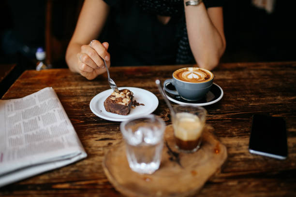 istock Coffee and cake on the table in a cafe in London downtown 925904964