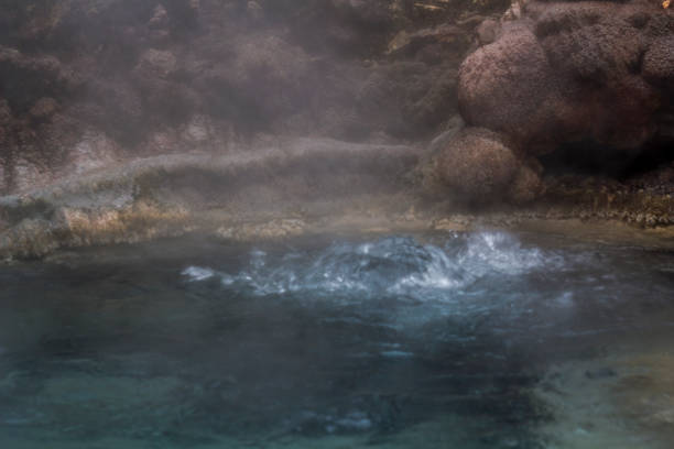 istock Geothermal activity, volcanic area and steam rising from terrace 925905120