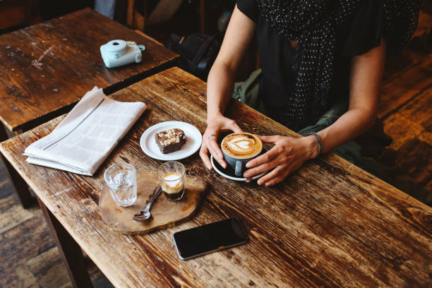 istock Coffee and cake on the table in a cafe in London downtown 925905252
