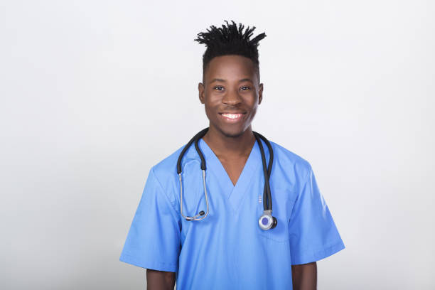 istock African-American doctor on a gray background 925905824