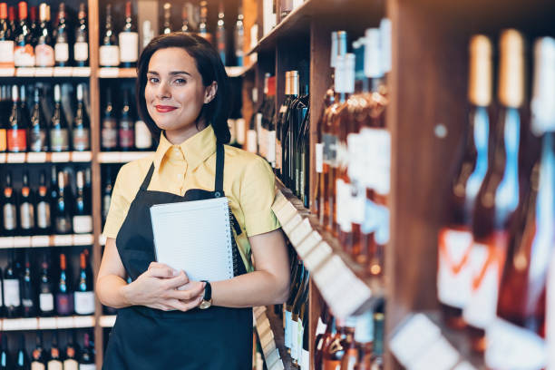 istock Smiling woman in a liquor store 925906004