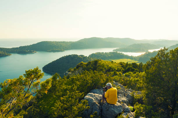 Men photographing Island Mljet