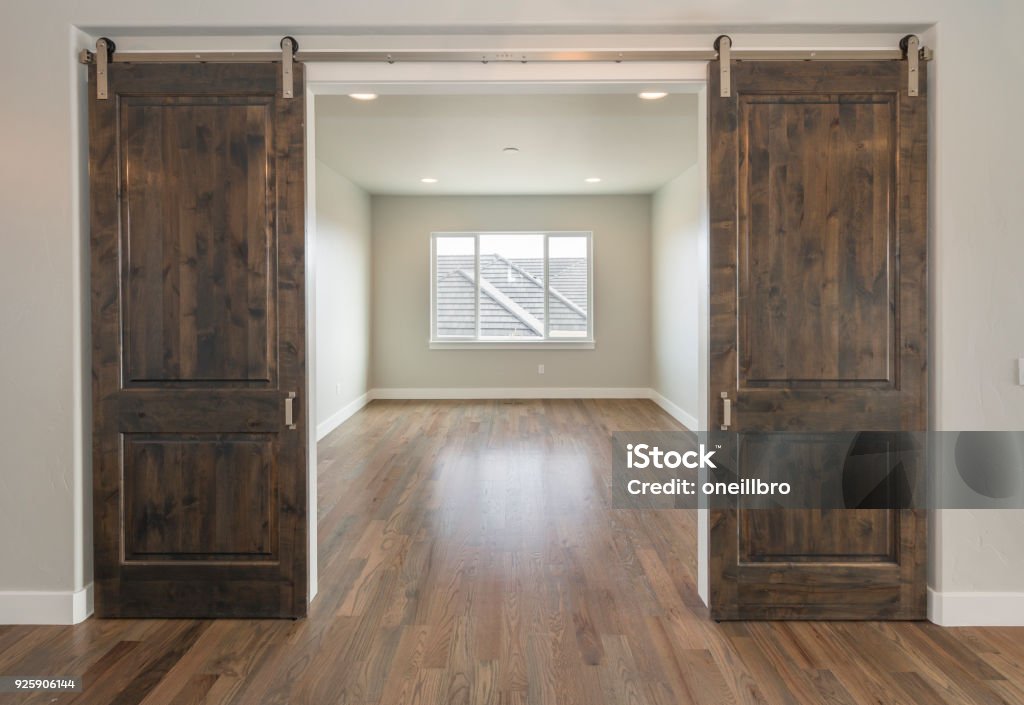 Beautiful Farm House Double Barn Doors double sliding Farm house doors Door Stock Photo