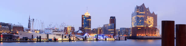 Elbe Philharmonic Hall (Elbphilharmonie) and River Elbe panorama in winter at morning with snow in Hamburg, Germany Elbe Philharmonic Hall (Elbphilharmonie) and River Elbe panorama in winter at morning with snow in Hamburg, Germany elbphilharmonie photos stock pictures, royalty-free photos & images