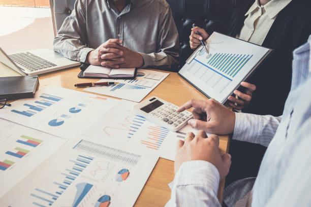 istock Meeting and greeting, Business team colleagues discussing working analysis with financial data and marketing growth report graph in team, Meeting Talking Brainstorming Communication Concept 925912274