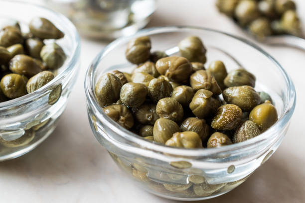 istock Edible Capers in Glass Bowl Ready to Eat. 925912504