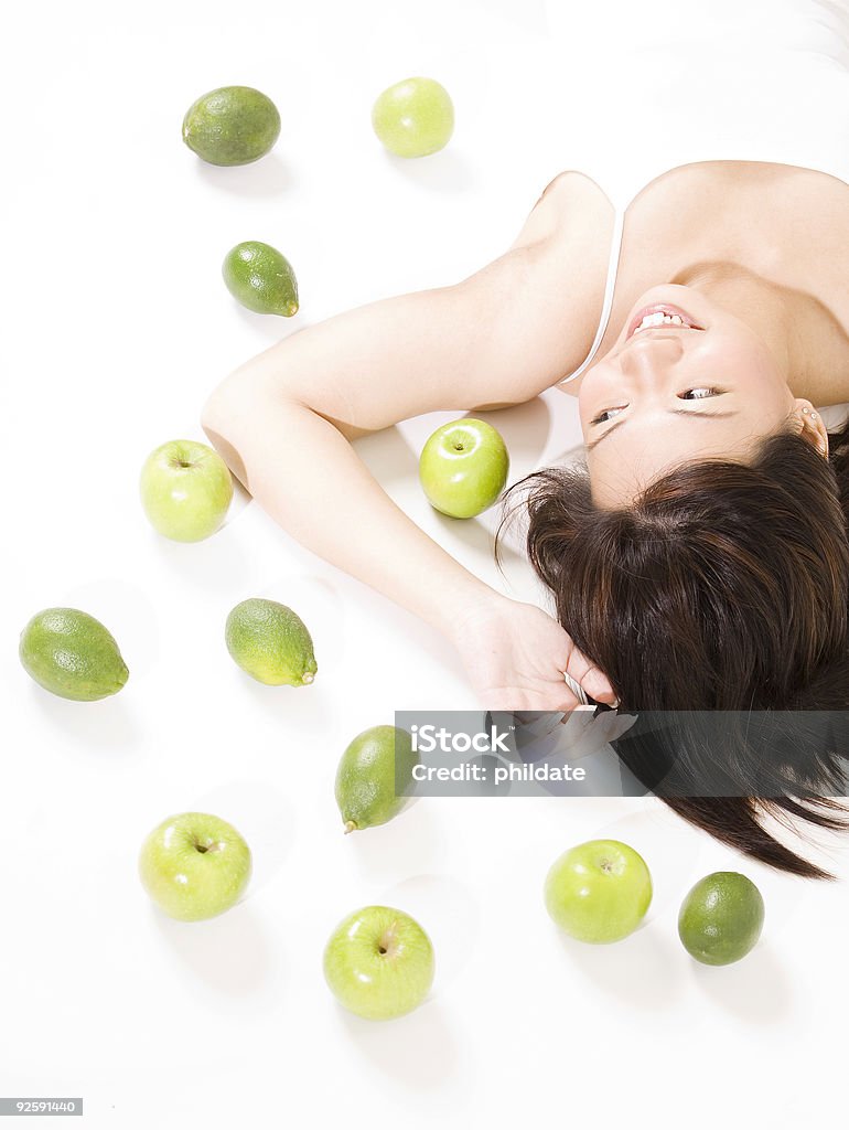 Ragazza con frutta 7 - Foto stock royalty-free di Adulto