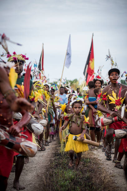 Mbore adults and children celebrate the Mborena Kam New Testament dedication on July 26, 2017, in Madang Province, Papua New Guinea. The work to translate the New Testament into this language, one of more than 800 in Papua New Guinea, took over 30 years.