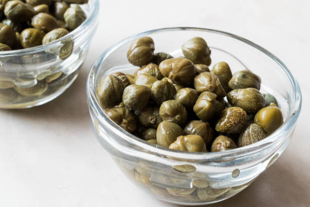 istock Edible Capers in Glass Bowl Ready to Eat. 925917112