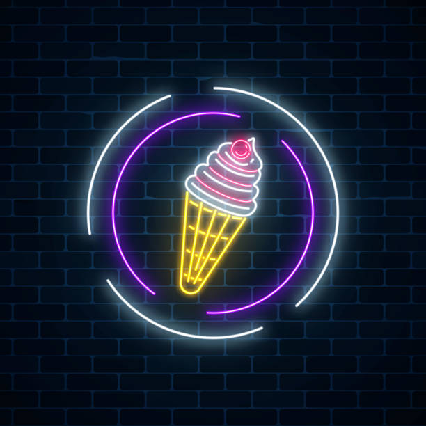istock Glowing neon sign of ice cream cone in circle frames on dark brick wall background. Fruit ice-cream in waffle cone. 925920556