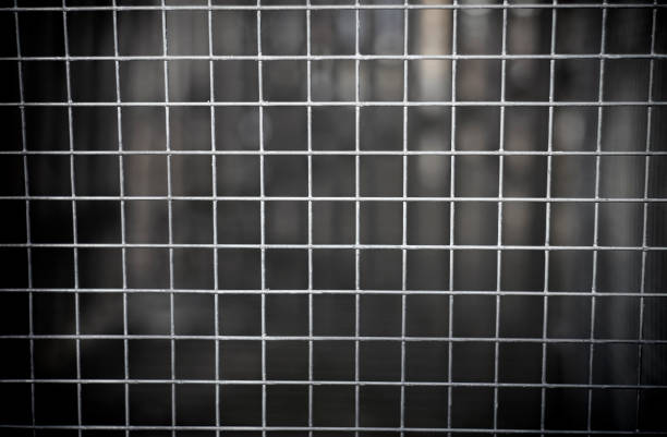 abstract photo of iron bars from jail or fence