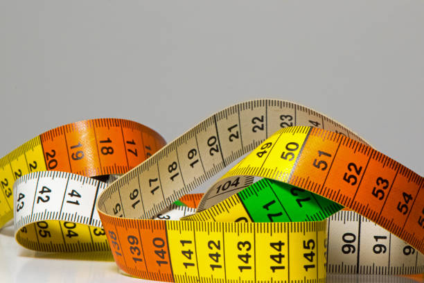 istock Macro shots of a measuring tape used by textile processors 925936962