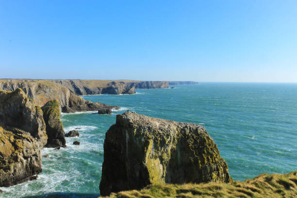istock Rugged Coastline and Crashing Waves 925937900