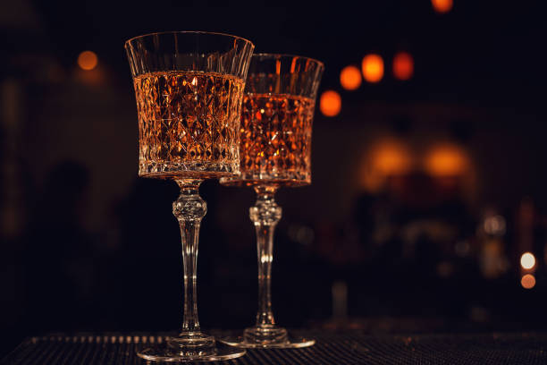 istock vintage wine glass on the bar 925941566
