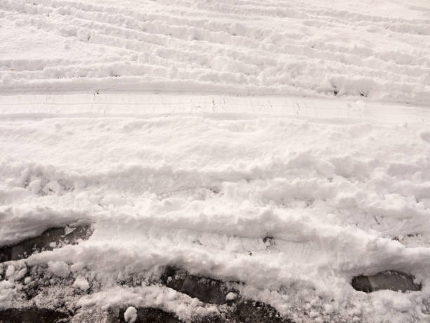 istock surface full view of snow on ground with footsteps texture winter 925957240