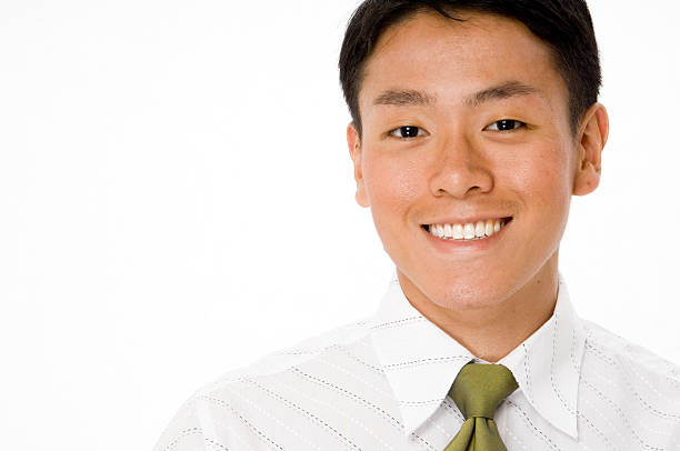 istock Young businessman smiling on a white background 92595971
