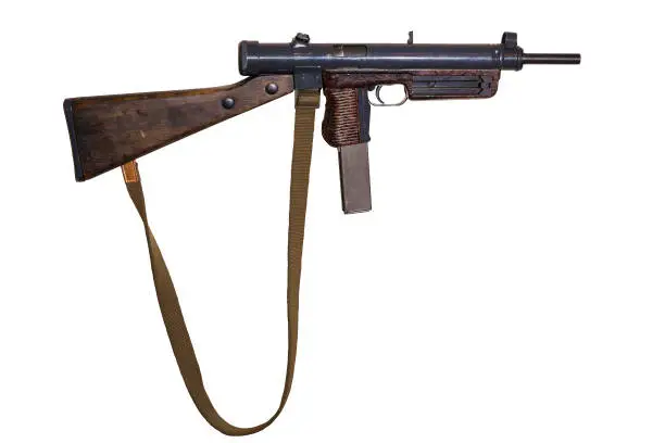 Photo of vintage submachine gun on white background