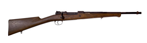 Vintage hunting rifle, converted from an army carbine, on a white background Vintage hunting rifle, converted from an army carbine, isolated carbine stock pictures, royalty-free photos & images