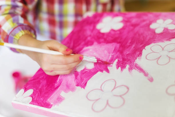 istock children's hands draw a house for dolls. child creativity Place for text 925974858