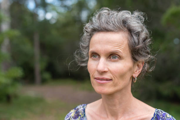 istock Middle aged woman in nature 925980074