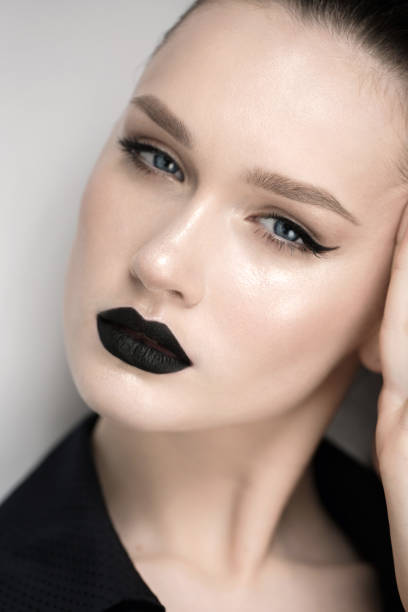 istock professional model with make up black lipstick eyeliner 925980220