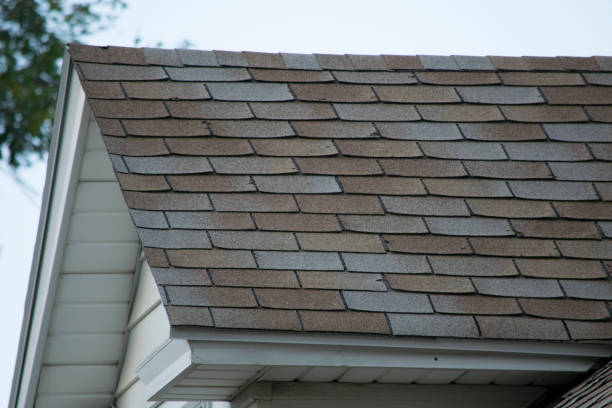 istock Damaged and old roofing shingles on a house 925998396