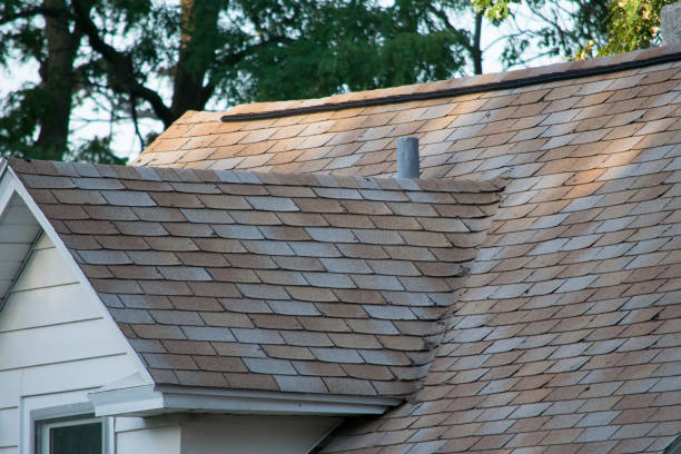 istock Damaged and old roofing shingles on a house 925998400