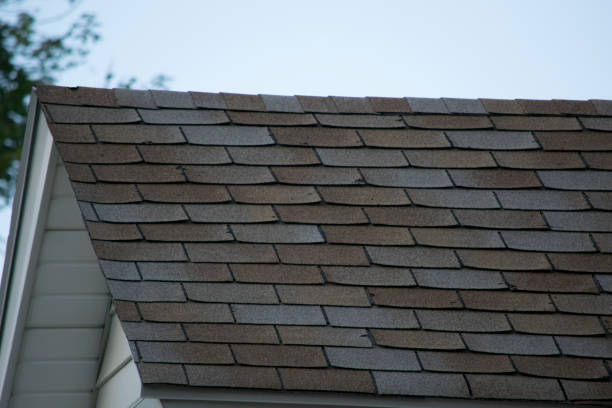 istock Damaged and old roofing shingles on a house 925998456